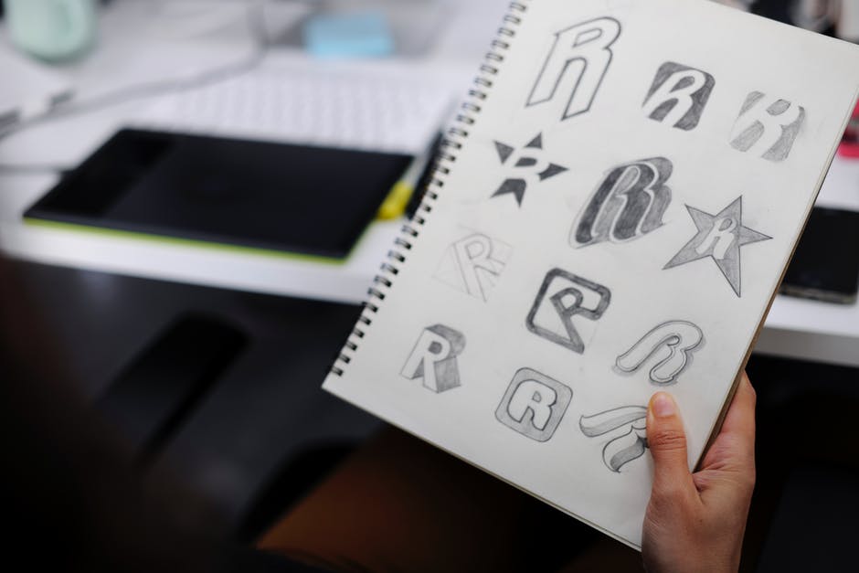 logo designs on sketchpads